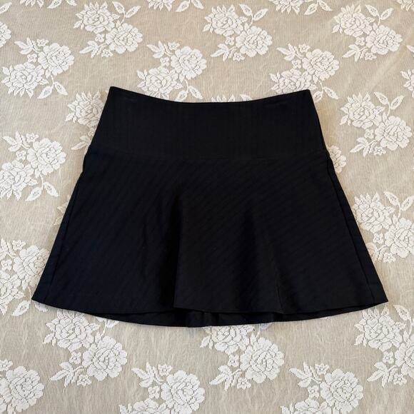 bebe Dresses & Skirts - Vintage Bebe Black Flared Mini Skirt Size 2